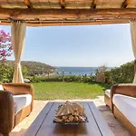 Dom wakacyjny Luna Bay Retreat Con Vista Sulla Baia Di Porto Luna A 2 Km Da Villasimius